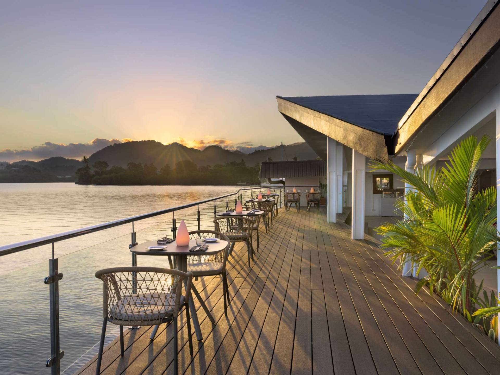 Novotel Suva Lami Bay waterfront deck dining at sunset